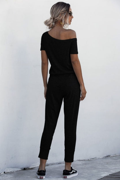 Asimmetriese nek-gebind jumpsuit met sakke