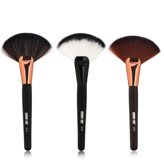 Single large fan blush brush with wooden handle