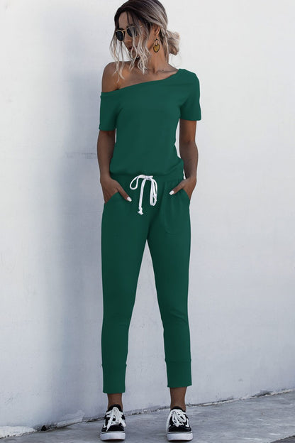 Asimmetriese nek-gebind jumpsuit met sakke