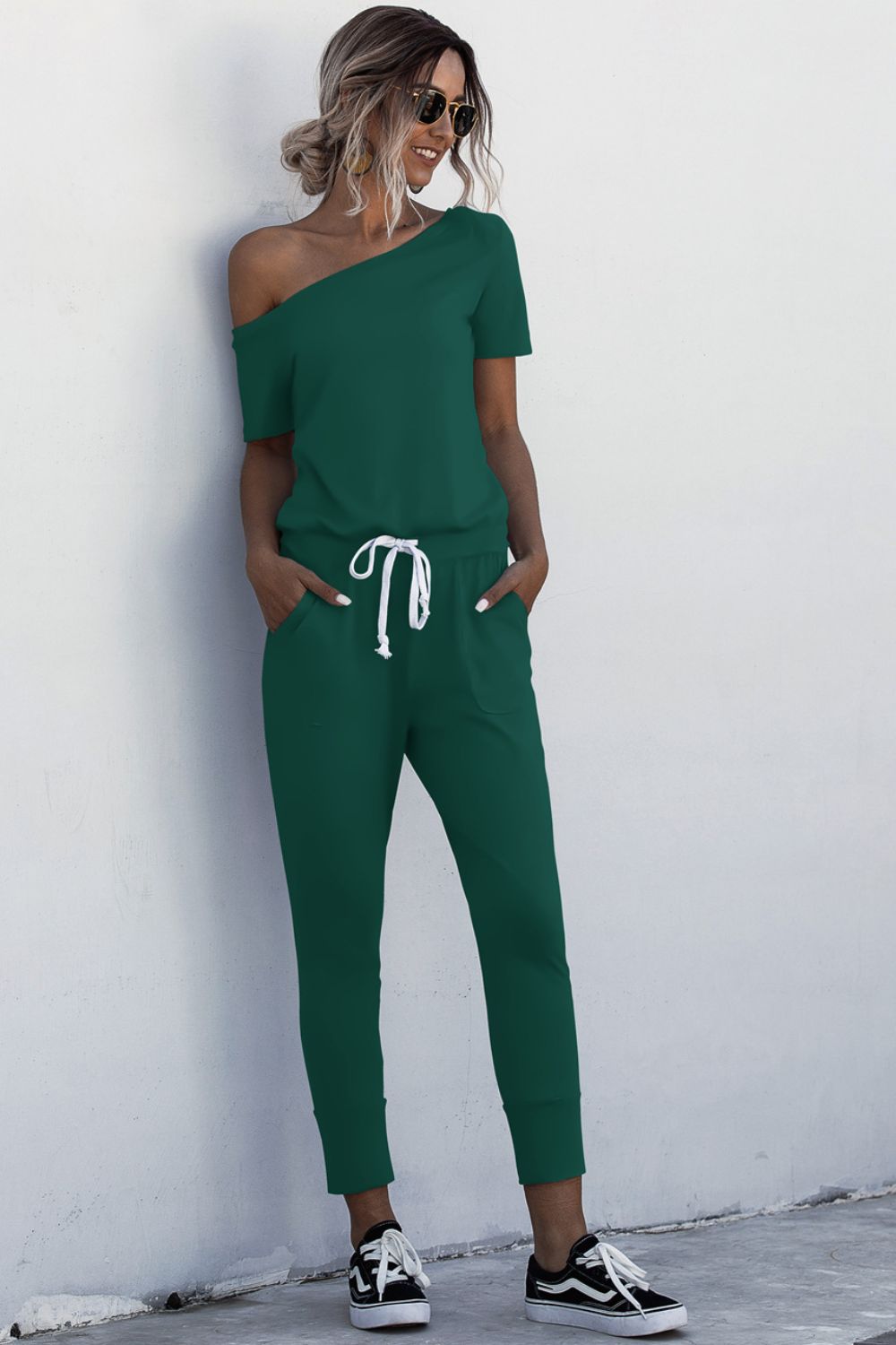 Asimmetriese nek-gebind jumpsuit met sakke