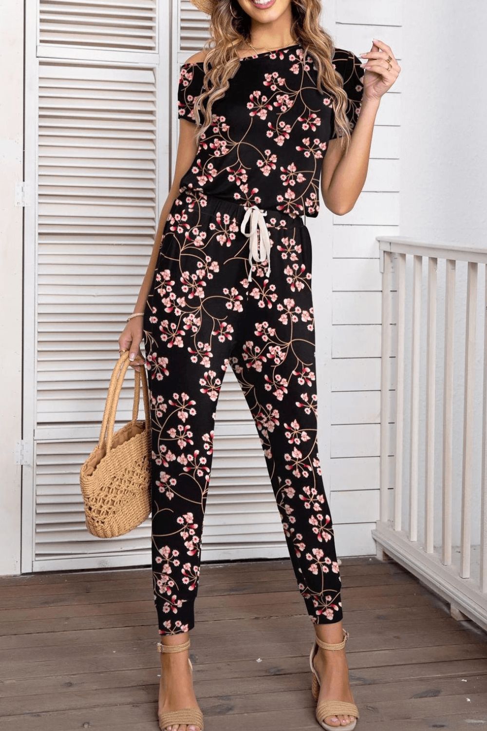 Asimmetriese nek kortmou jumpsuit